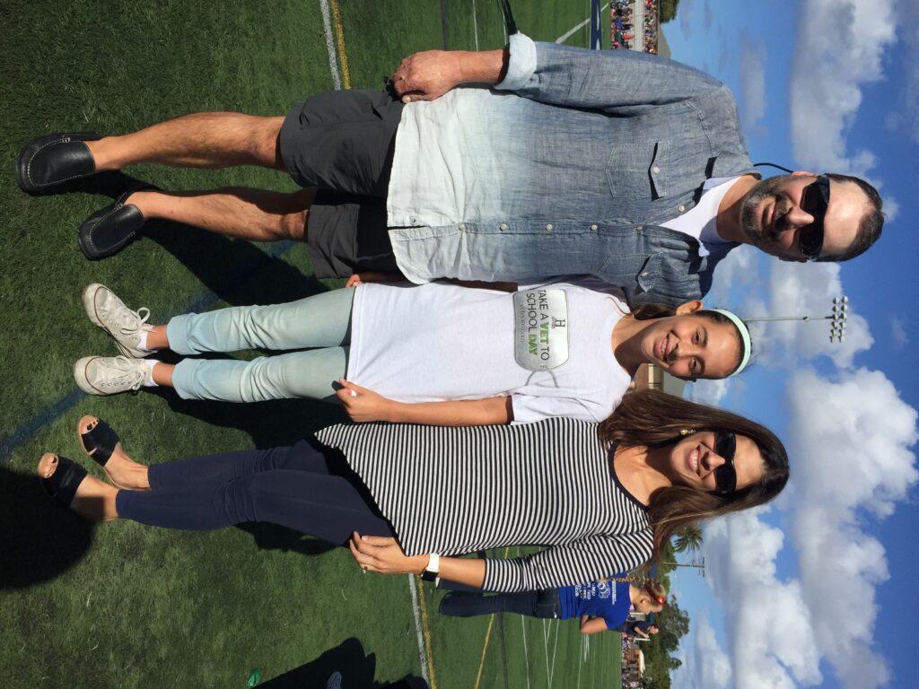 Veteran and 9/11 survivor Kevin Shaeffer, his daughter Sophia, and his wife Blanca after Sophia led the crowd in saying the Pledge of Allegiance.